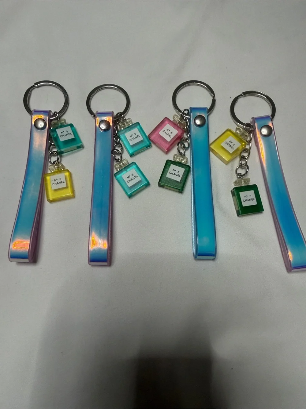 Sets of 4 Unbranded Iridescent Blue Keychain with Colorful Mini Perfume Charms